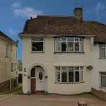 Image of front of a house in Greenfield Crescent Patcham Brighton | Open House Estate Agents Brighton