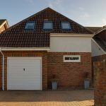 Image of the front of a detached House in Peacehaven | Open House Estate Agents Peacehaven